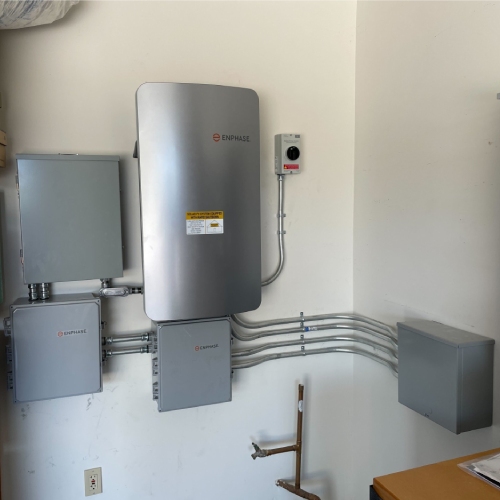 Saguaro Solar electrician inspecting a home electrical panel