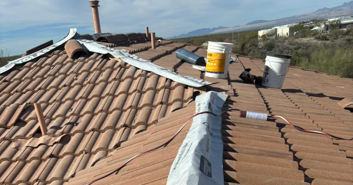 Roof leak repair in progress in Tucson