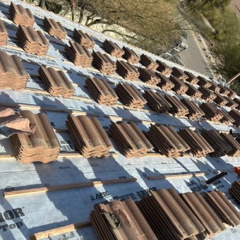 Roof repair in progress on a Tucson home