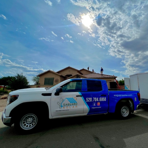 Saguaro Solar, Electric, and Roofing truck arriving for a roof leak repair in Tucson