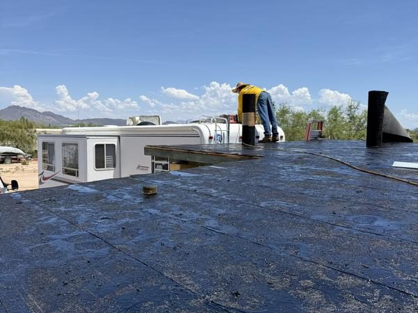 Rooftop equipment on a coated commercial flat roof in Tucson