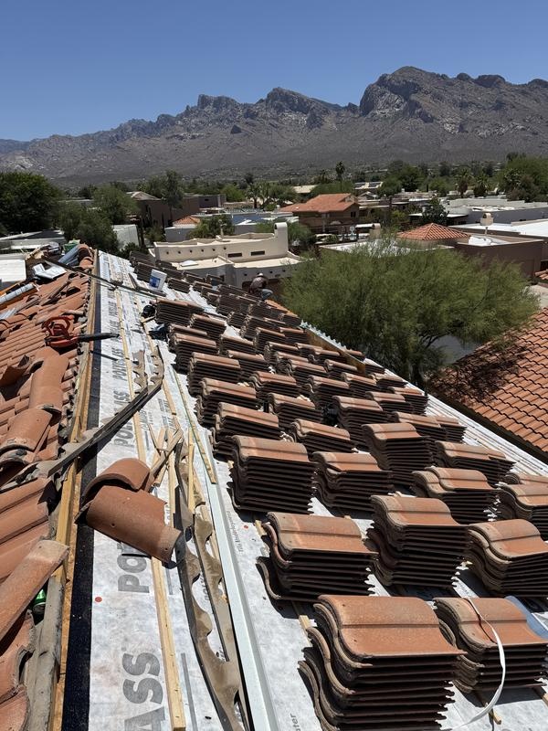 Tile roof replacement underway on a Tucson home